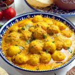 Dahi wale aloo ki sabji with Poori and Raita