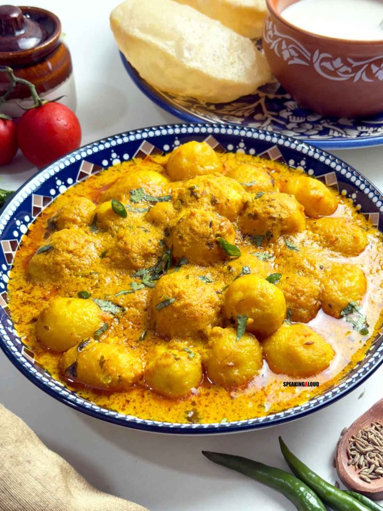 Dahi wale aloo ki sabji with Poori and Raita