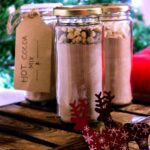 homemade dry hot cocoa mix in glass jars for christmas edible gifts